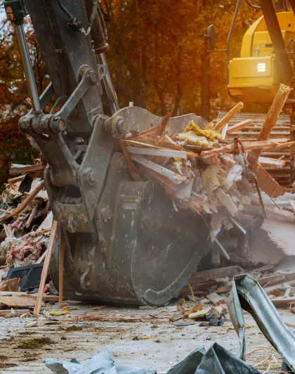 Interior demolition worker using tools in Dallas TX residential project