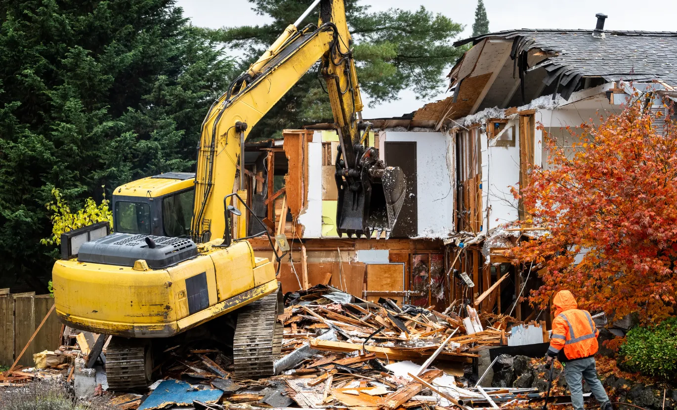 Residential demolition with excavator in Dallas TX by Dallas Demo Experts