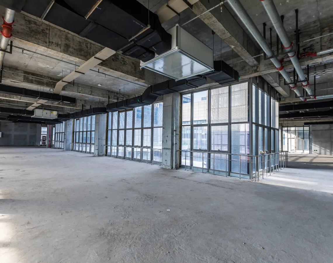 Commercial interior demolition in Dallas TX with open office space after full interior strip out