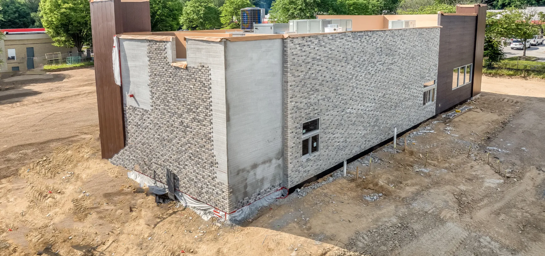 Old commercial property before demolition in Dallas TX showing aging structure