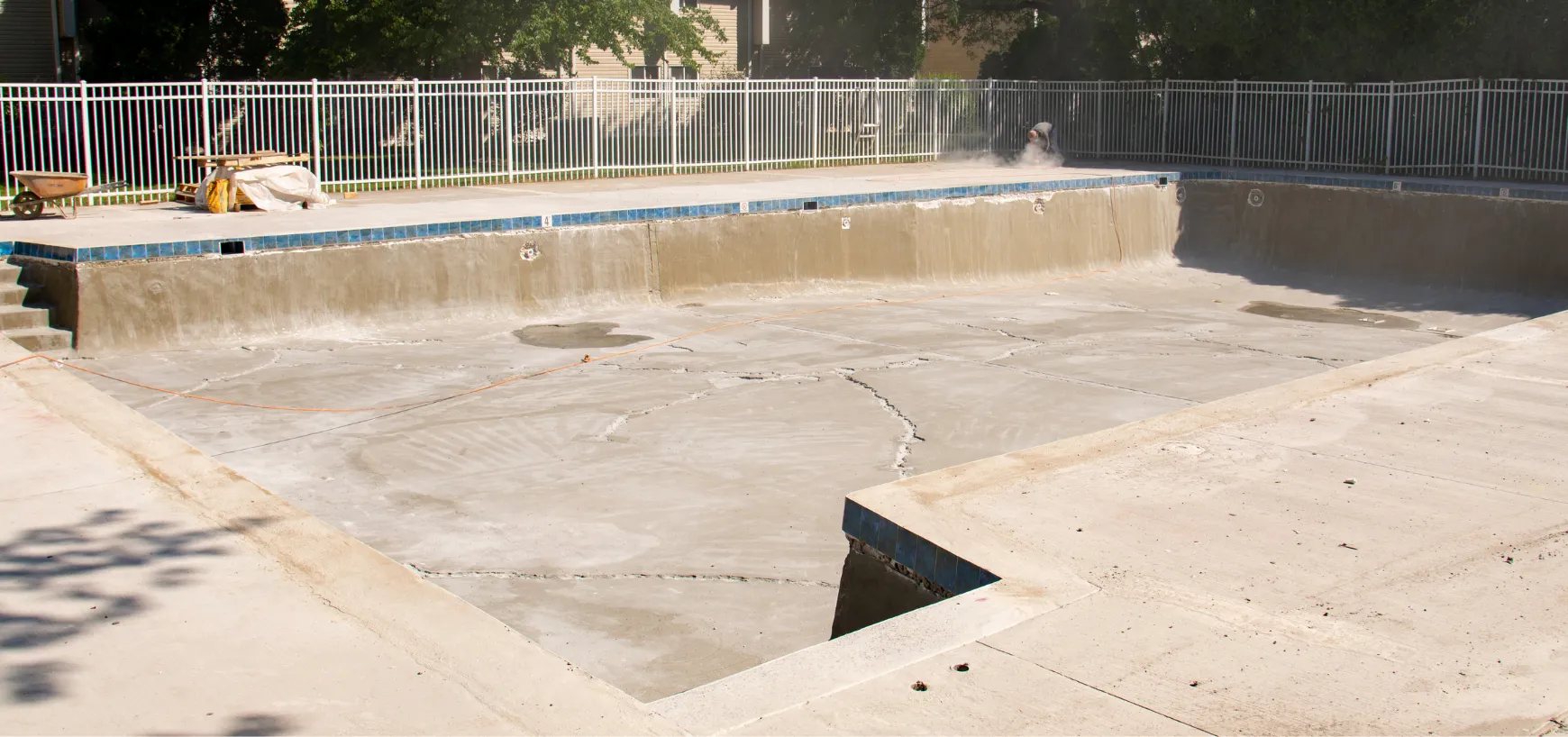Pool demolition project in Dallas TX showing cleared lot ready for new construction